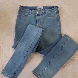 Free People light wash skinny long jeggings